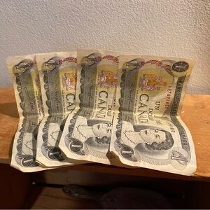 Four 1973 Canadian One Dollar Bills
